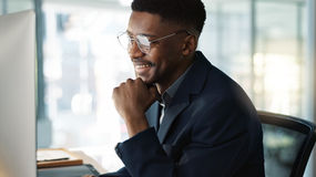 A man working at a computer. 