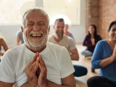 A group of people meditating.