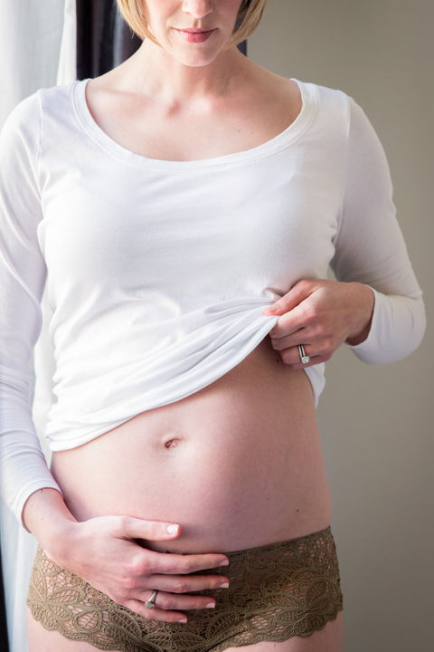 Elegant maternity image in the studio