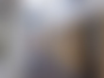 Man walking past property screen