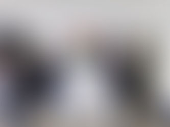 People walking past a real world media screen