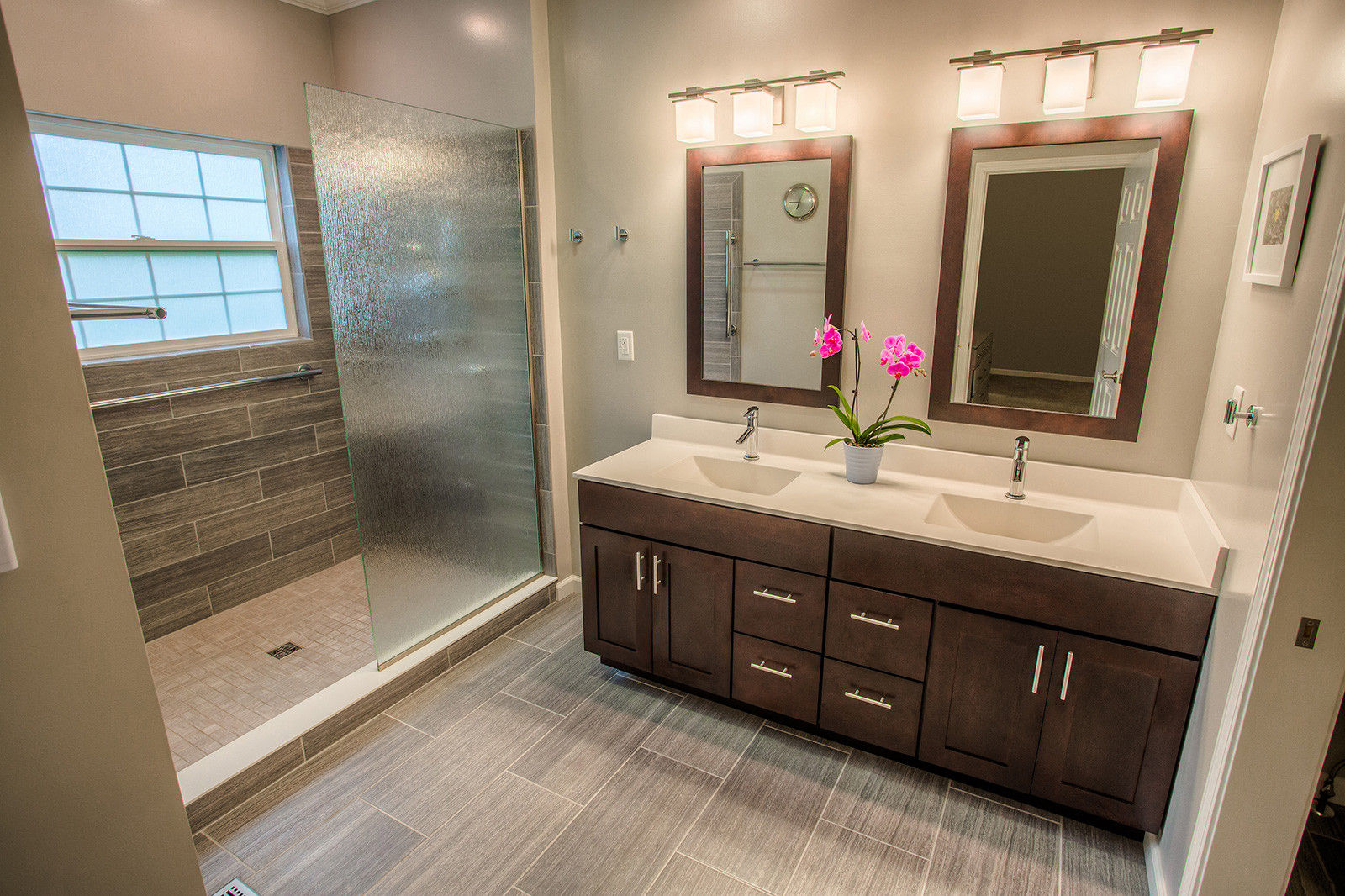 Bathroom with a shower, vanity, mirrors, and fixtures, Home Repair Services