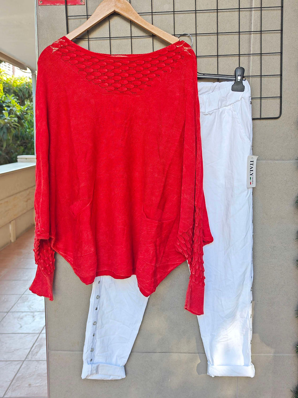 Thumbnail: Imported trousers with stud and stone details.