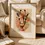 Miniaturbild: Florales-Poster: Giraffe mit Blumenkranz im Vintage-Stil.