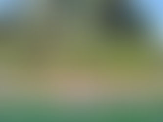 A Serene Lakeside Hideaway Surrounded by Towering Limestone Cliffs