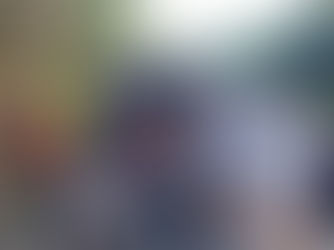 A Peaceful Moment Floating Beneath Towering Limestone Cliffs