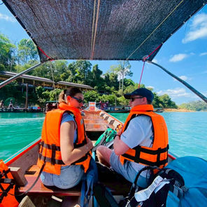 Departure journey across Cheow Lan Lake after an unforgettable stay