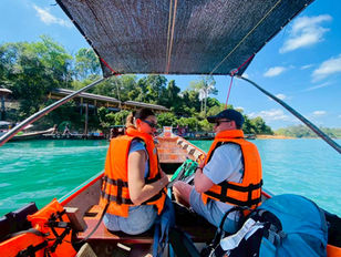 Departure journey across Cheow Lan Lake after an unforgettable stay
