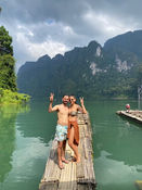 Couple exploring limestone landscapes on Cheow Lan Lake