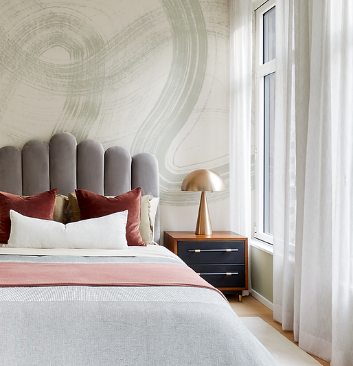 Calm, layered bedroom designed for rest and wellness as part of a residential interior project.