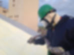 Man Coating roof
