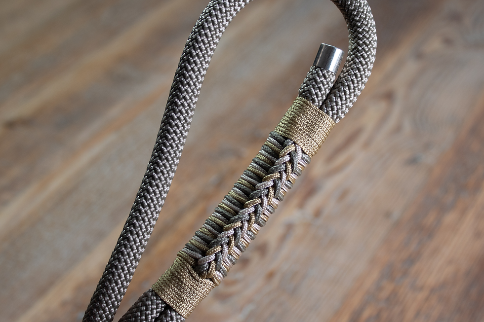 Close up of webbing on kahki rope dog leash