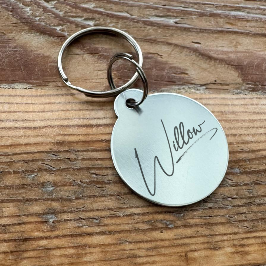 Engraved steel circle dog tag