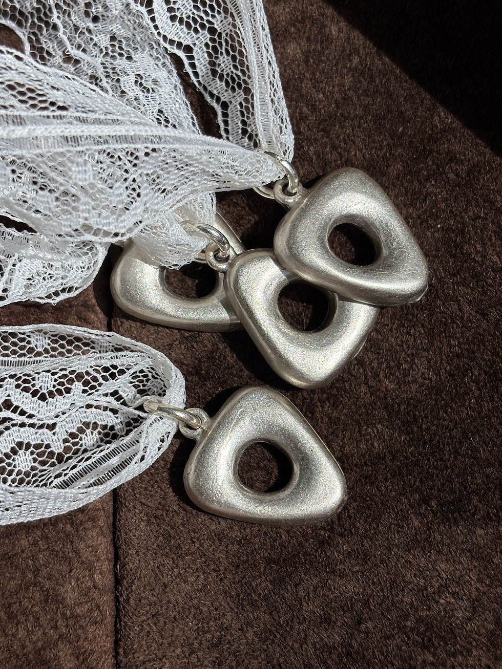 Silver Triangle Iris Necklace with white lace detail