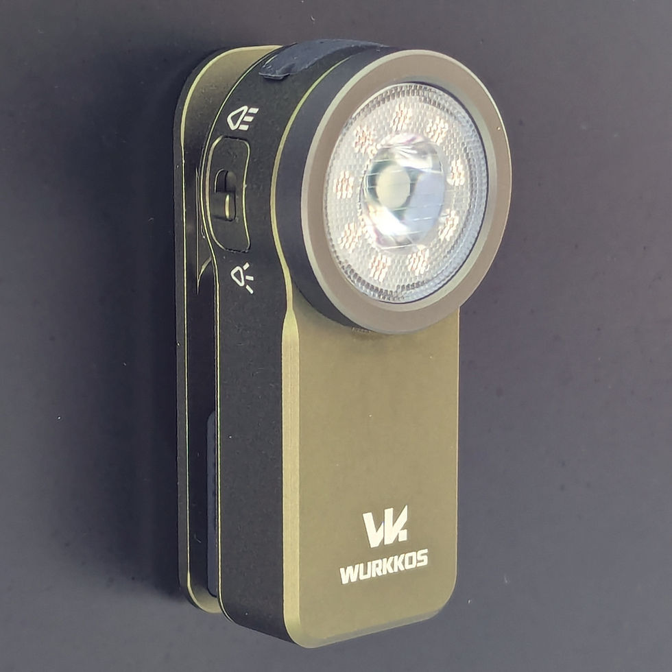 Wurkkos HD03 attached magnetically to a metallic surface.