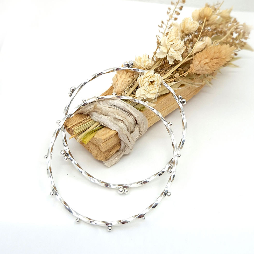 Thumbnail: Handmade sterling silver bangles with granulations