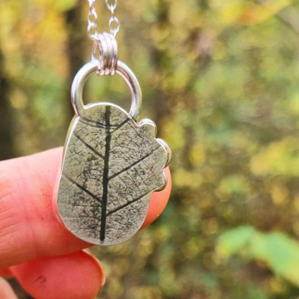 Thumbnail: Amber sea glass and sterling silver pendant necklace