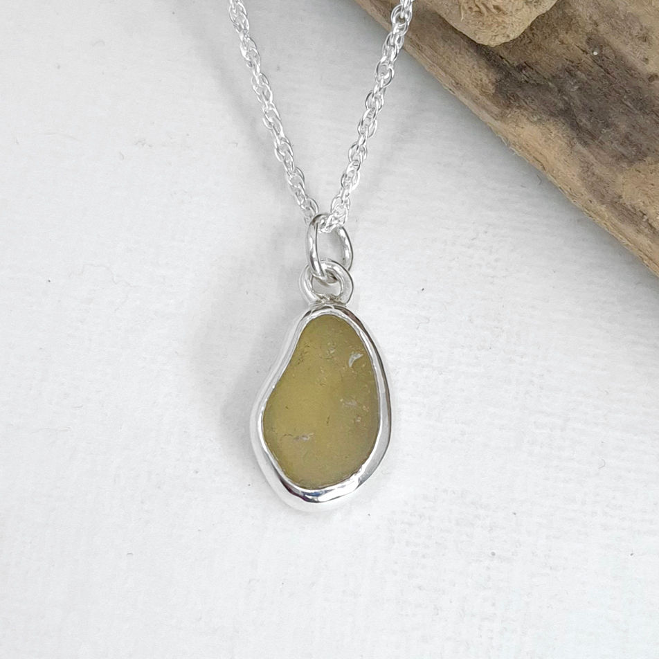Light yellow Seaham sea glass necklace in a handmade sterling silver bezel