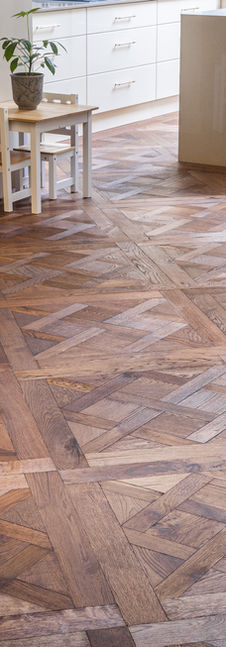 Elegant rustic design engineered timber floor panels installed throughout a spacious house in Sydney featuring fine details and precision assembly. 