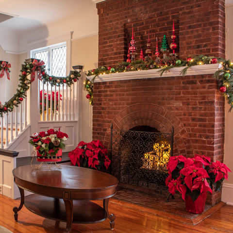 colonial holiday evergreen ornaments finials garland pointsettia