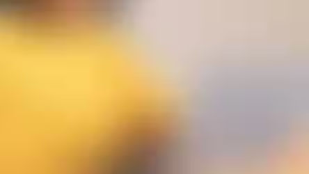 A woman typing on computer.