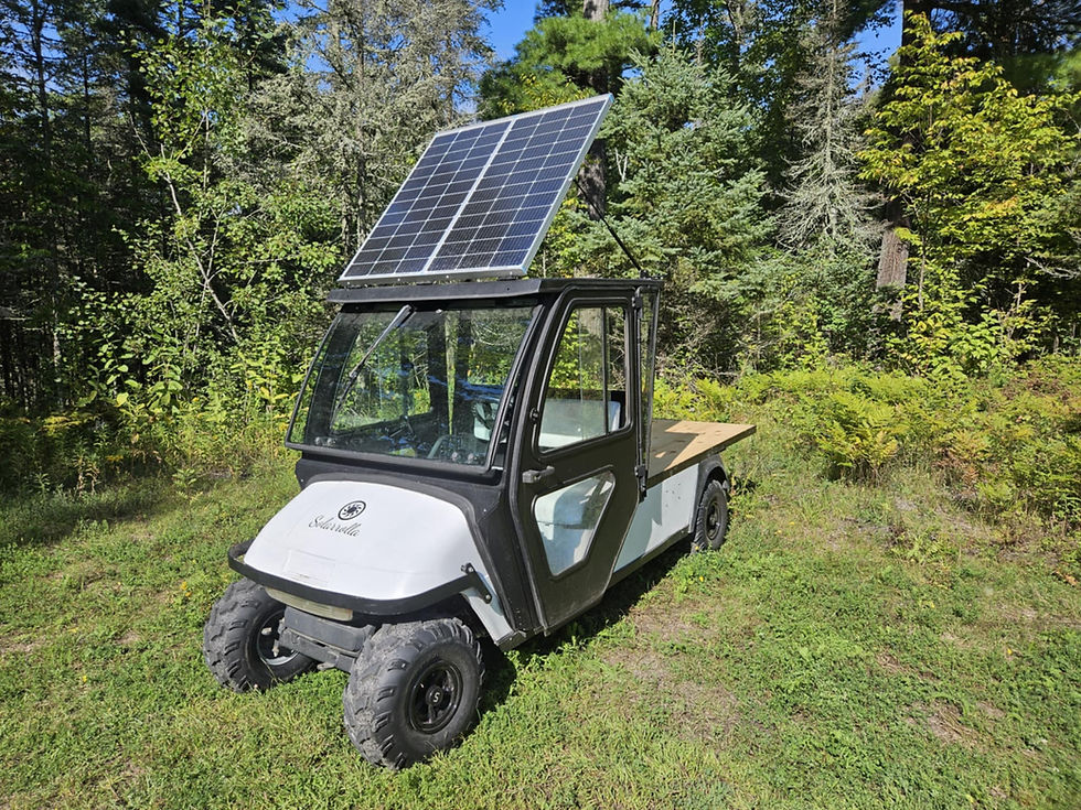 2009 EZ-GO Enclosed Shuttle Flatbed with Tracking Solar