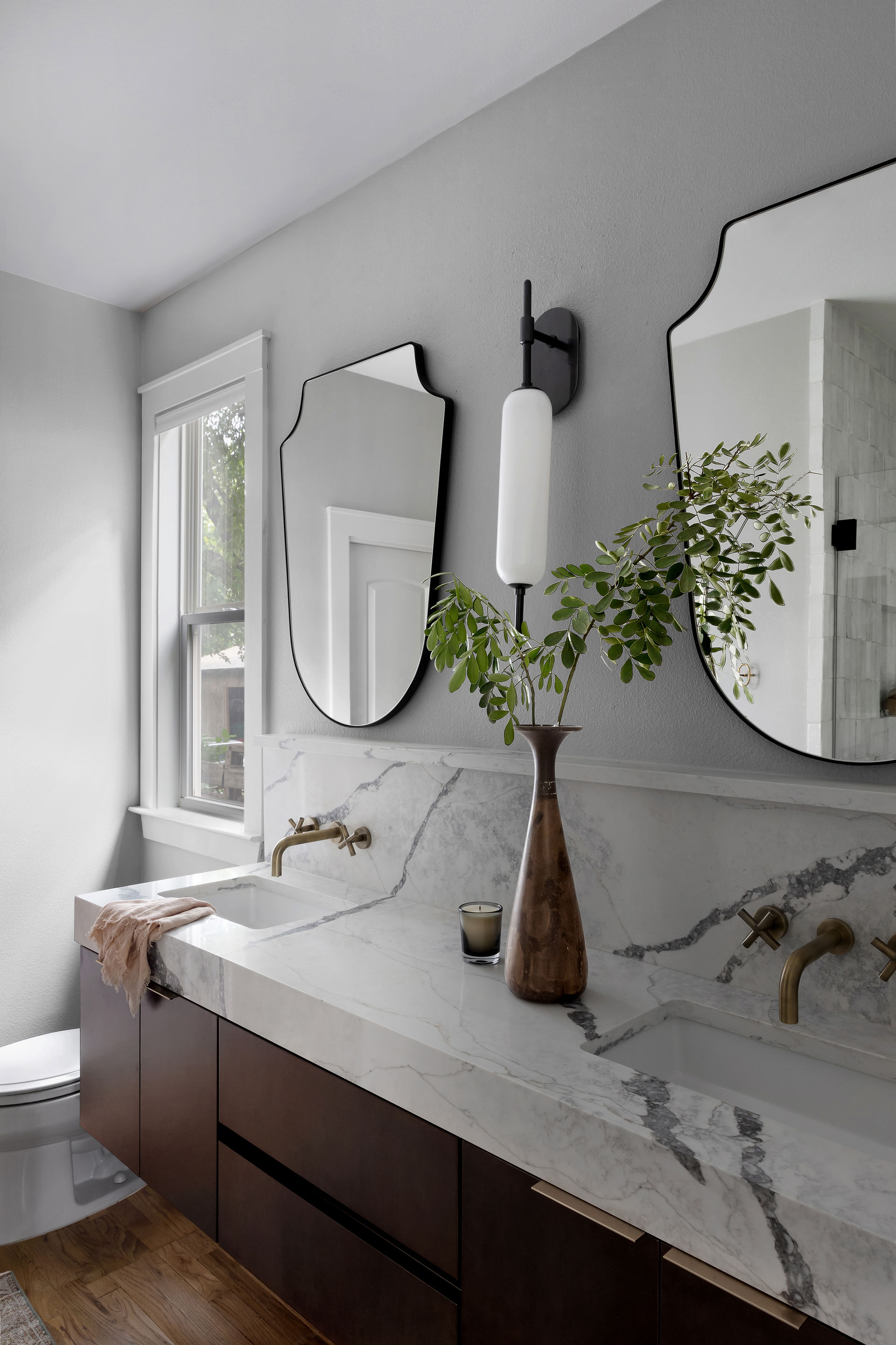 bathroom remodel with marble style counter top