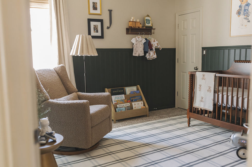 Vintage travel-inspired nursery with warm olive tones and classic Ralph Lauren style