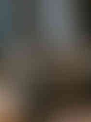 Timeless Christmas table setting featuring antique glassware and natural greenery