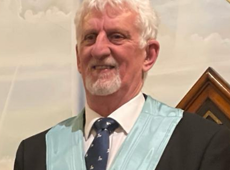 Malcolm Headshot.png