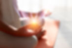 side-view-adult-meditating-with-light.jpg