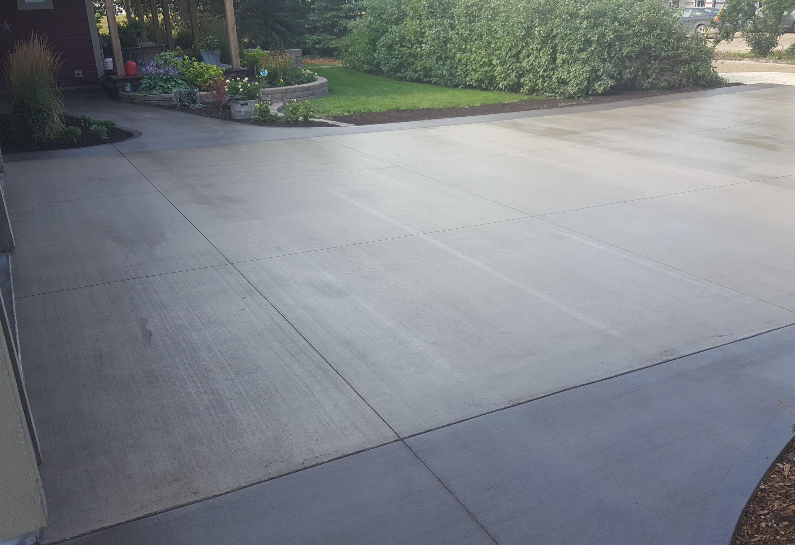 Coloured driveway with broom finish