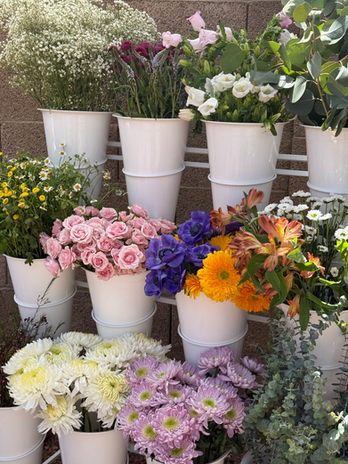 Floral bouquet station featuring fresh blooms and greenery