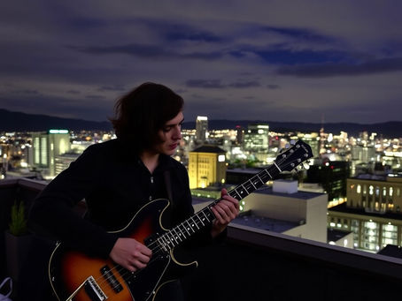 Six Strings on a Rooftop