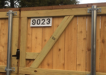 Address Sign on back alley fence