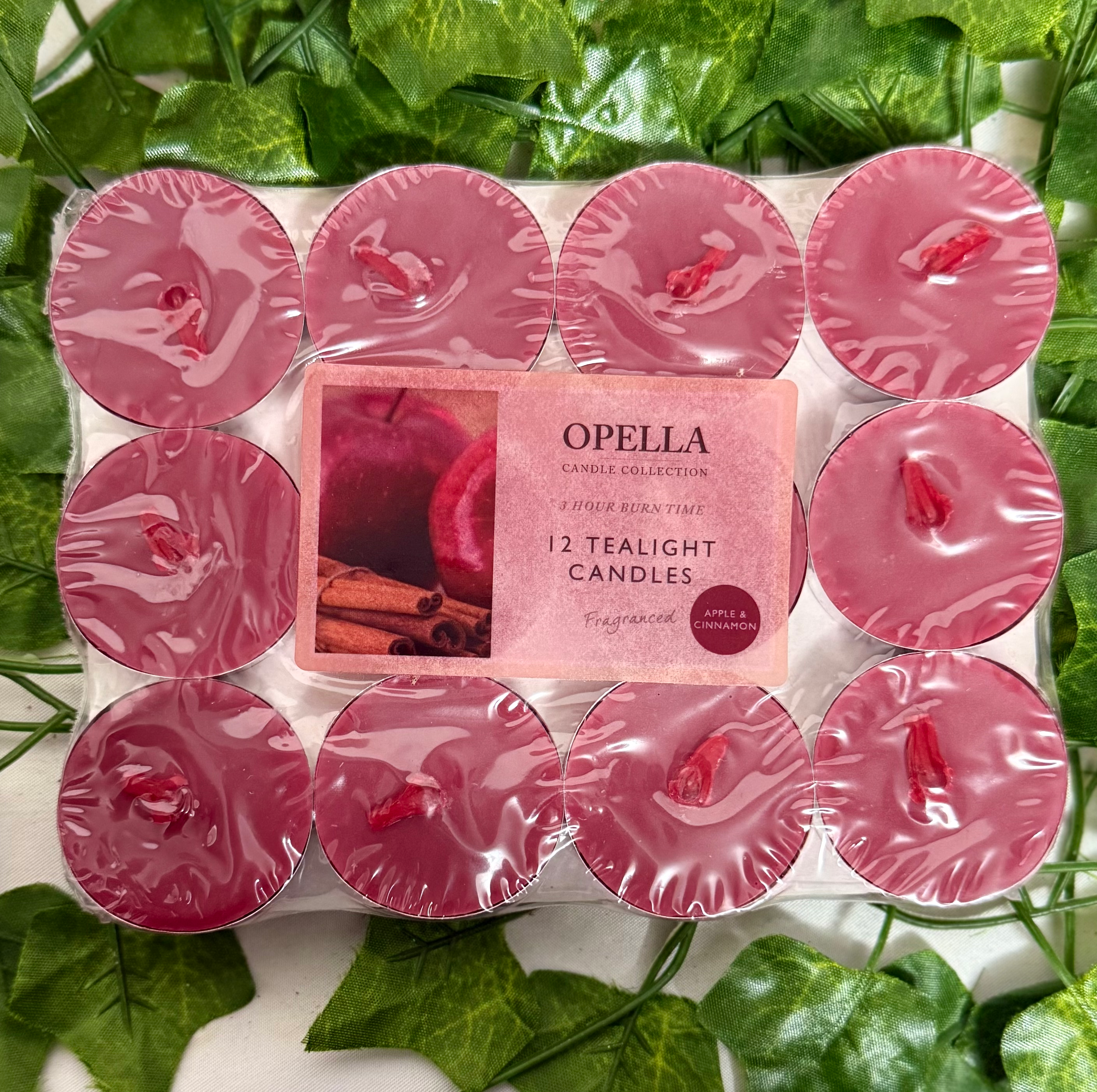 12 dark red tealight candles in plastic wrapping 