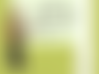 Person in green top, smiling and pointing at text bubble saying "IT'S ALL ABOUT YOU." Background is olive green. Website link below.