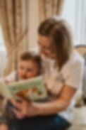 Nanny Cat and baby reading a book.JPG