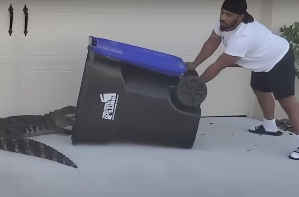 Florida Man taking out the trash.