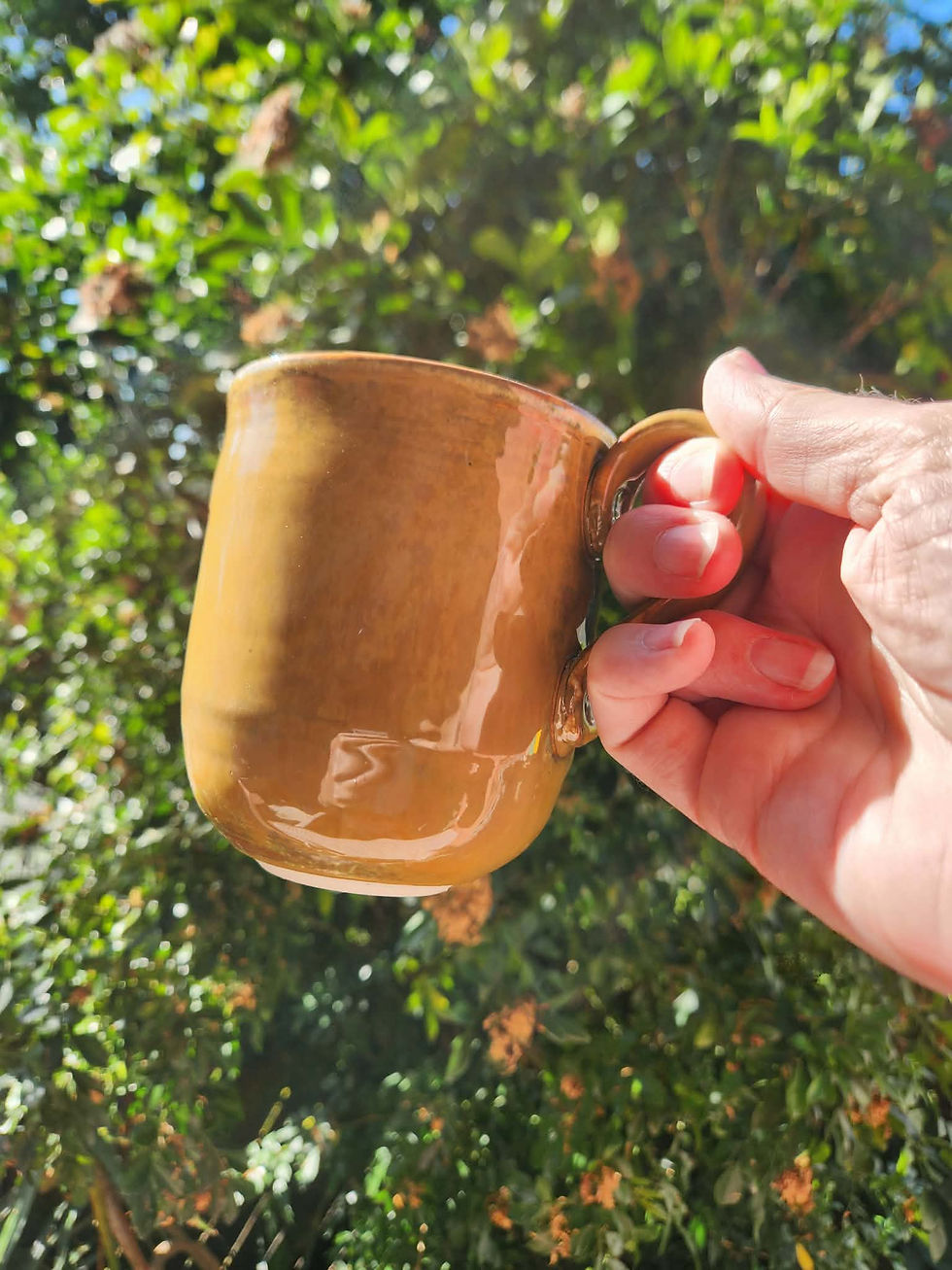 Thumbnail: Glossy tan handled mug