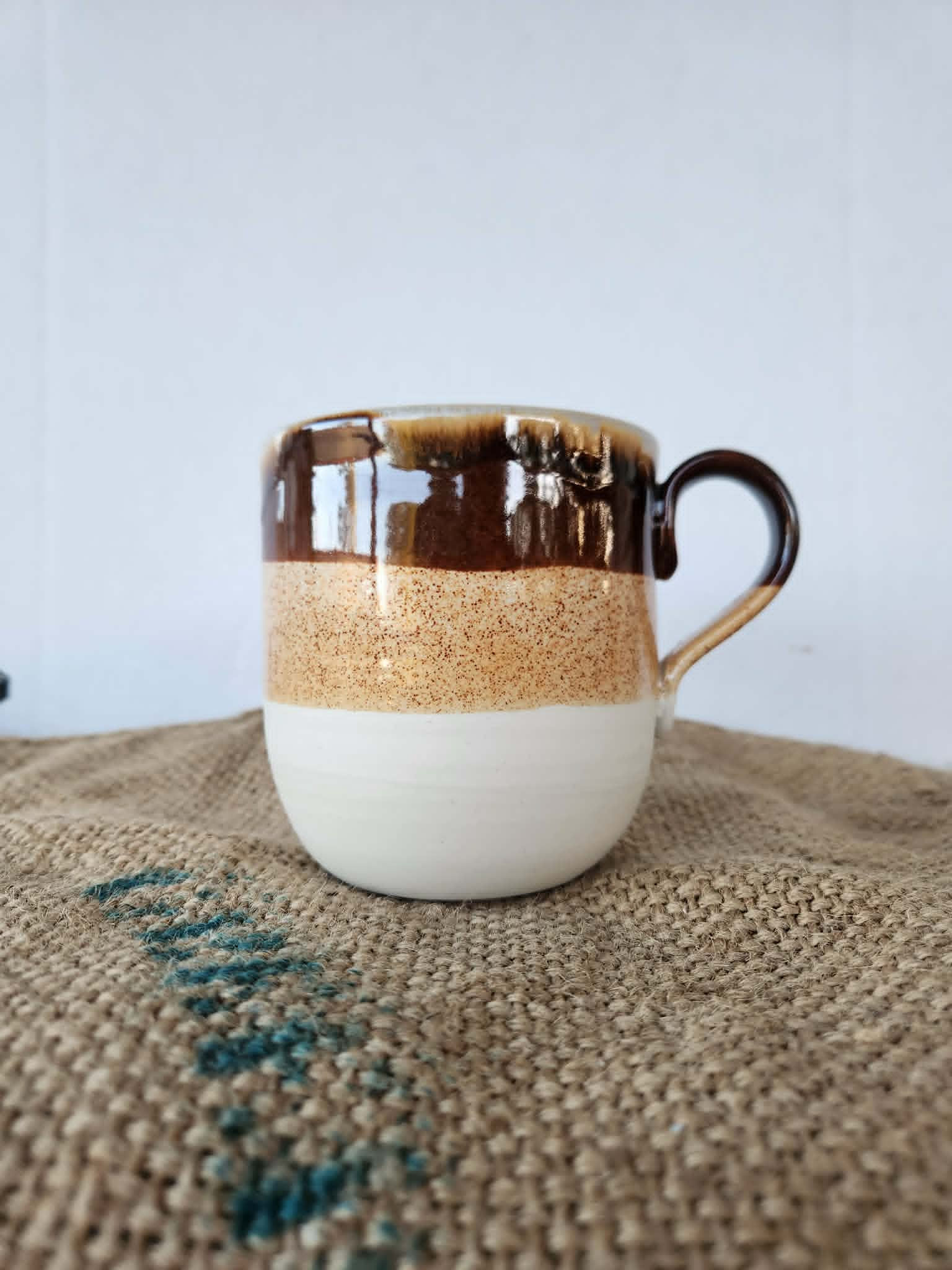 red earth handled mug