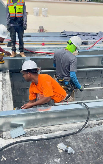 ClimateMakers technician working on a rooftop HVAC system installation at a commercial property in Charleston, SC, showcasing top-notch expertise in heating and cooling solutions for businesses in North Charleston, Summerville, and Mount Pleasant.
