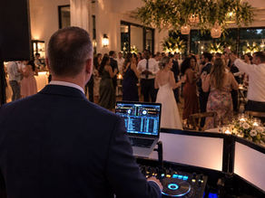 Charleston wedding DJ Shane Griffin reading the room during a wedding reception