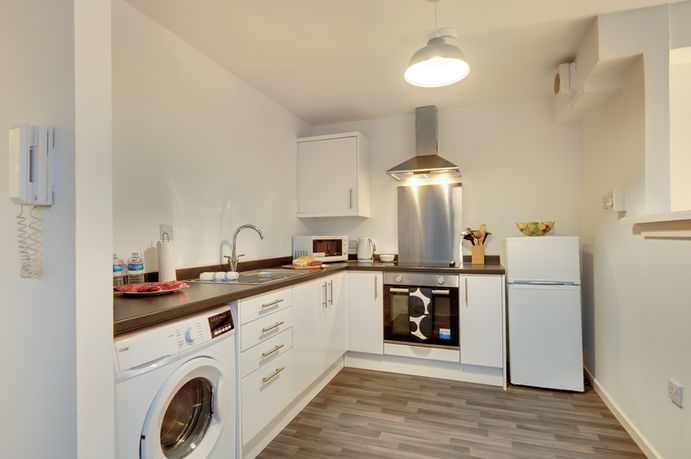 modern kitchen in Newcastle serviced apartment