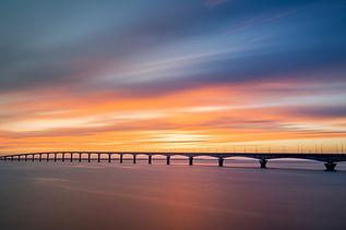 Pont de l'Île de Ré au coucher du soleil en pose longue — photographie de paysage par Benjamin Mineau