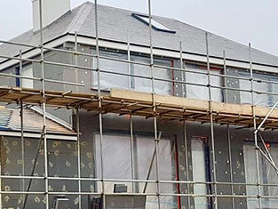 Exterior wall renovation project with insulation system installed