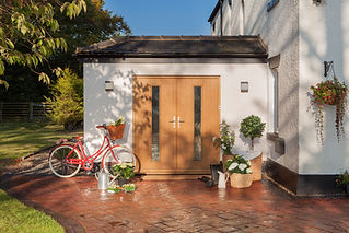 A cosy entrance with a light wooden double door