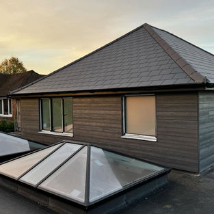 Contemporary grey roof lantern skylight installed on a flat roof extension