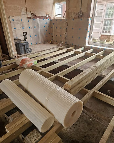Newly installed light wood floor joists frameworks during structural timber repair work