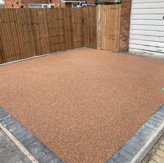 Resin-bound patio area with decorative edging